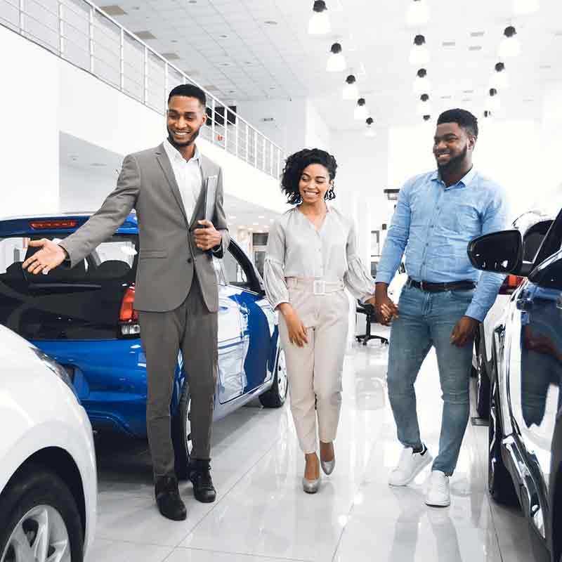 Plattner's Quincy Chevrolet GMC in QUINCY FL couple looking at new cars