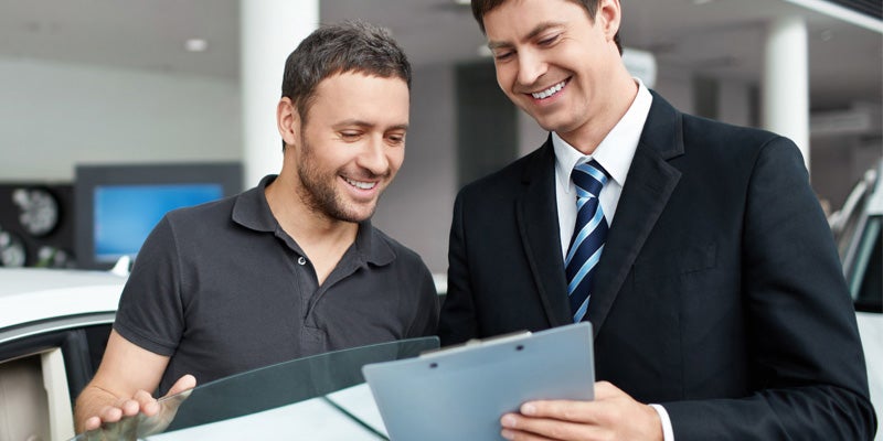 Plattner's Quincy Chevrolet GMC in QUINCY FL sales rep with customer