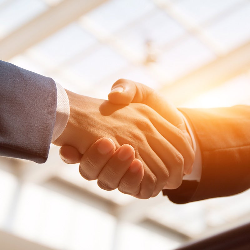 Plattner's Quincy Chevrolet GMC in QUINCY FL customer shaking hands with sales rep
